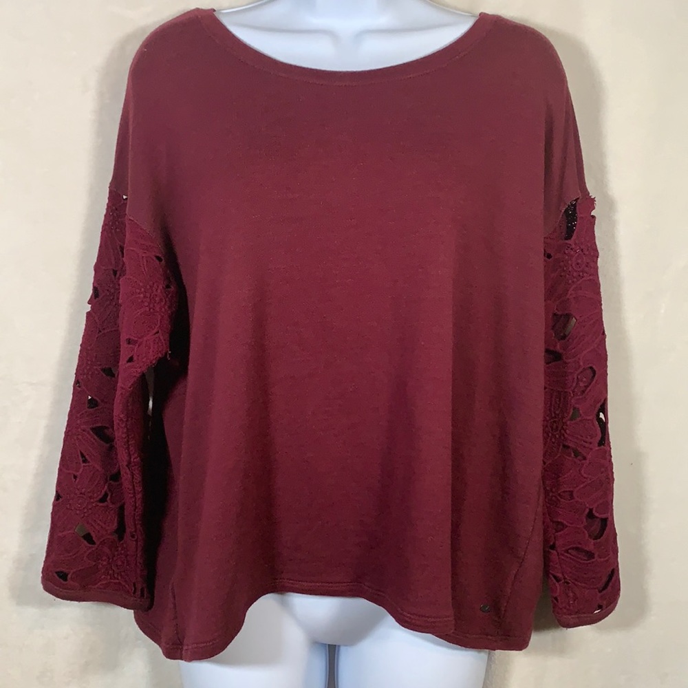 A.E.  sweater with open back and floral sleeves M